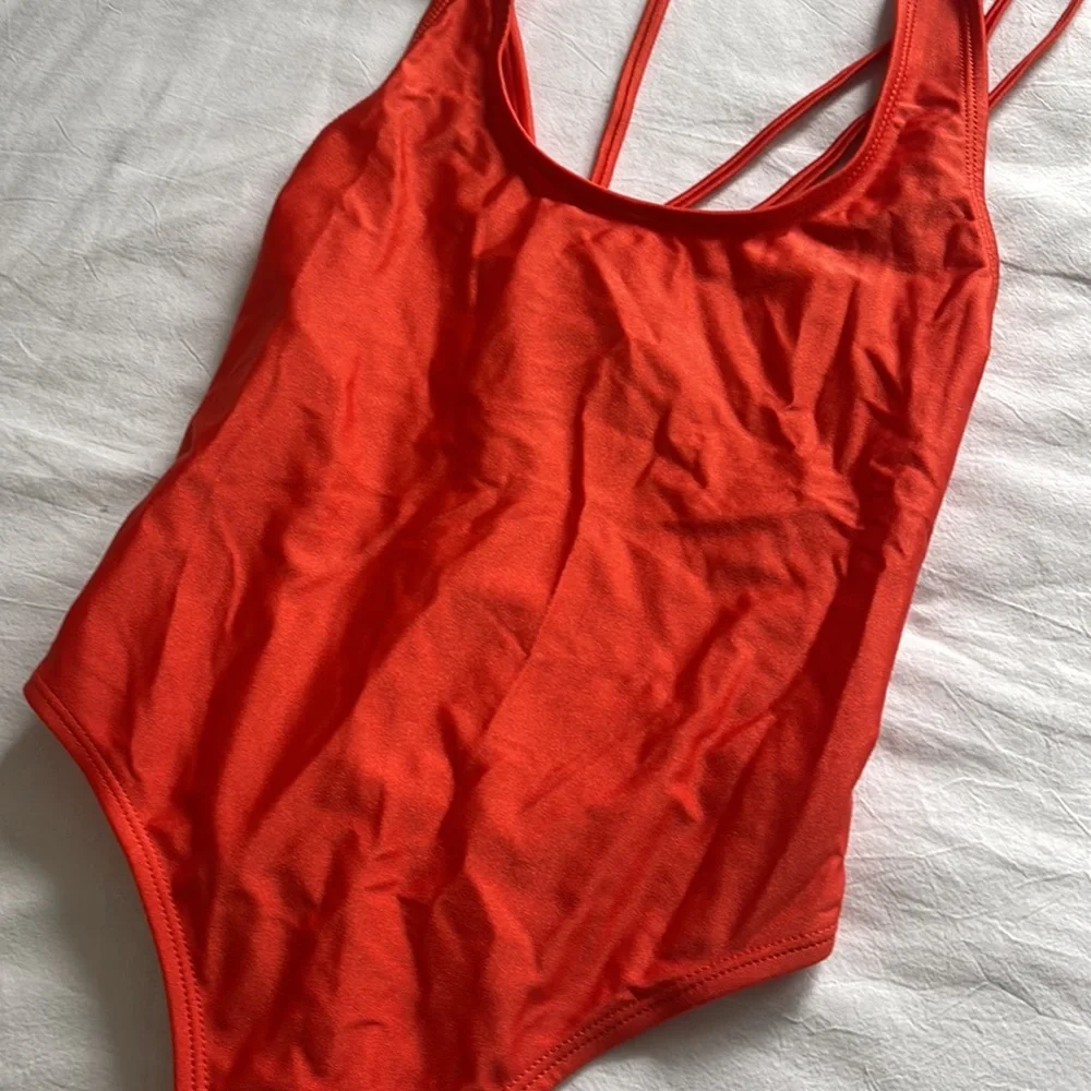 Glamorous bright orange one piece bathing suit